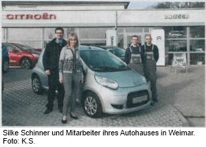 Bild: Silke Schinner und Mitarbeiter ihres Autohauses in Weimar. Foto: K.S.